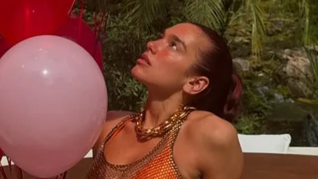 Dua Lipa Stuns in Orange Bikini for Birthday