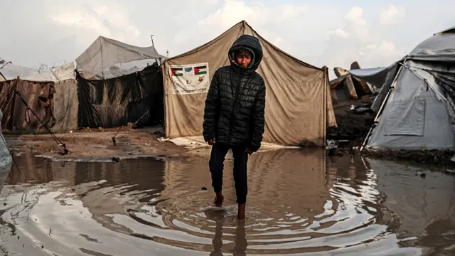 Baby dies from exposure after storm floods tents in Gaza