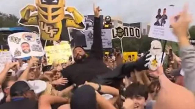 DJ Khaled crowd surfs at Big Noon Kickoff in Orlando