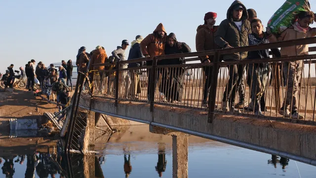 Civilians flee Deir Hafer as fears of military offensive escalate