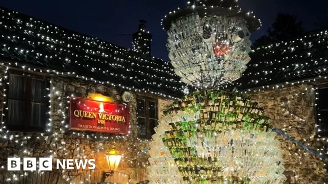 Why are thousands of lights covering the Queen Victoria Inn in Somerset?