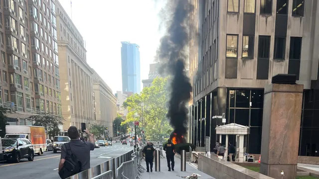 Former soldier sets fire outside federal building in NYC