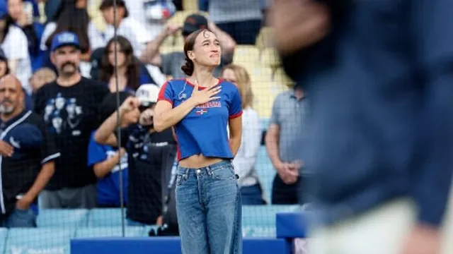 Singer defies Dodgers by performing national anthem in Spanish amidst protests