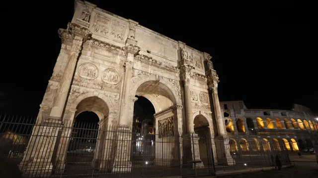 lightning strikes ancient Constantine Arch in Rome during storm