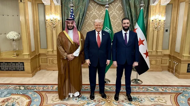 Trump shakes hands with controversial Syrian leader al-Sharaa