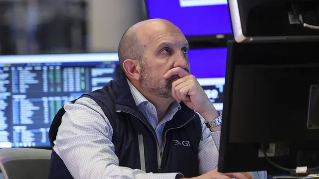 Wall Street dips as Tesla faces backlash over spending forecasts