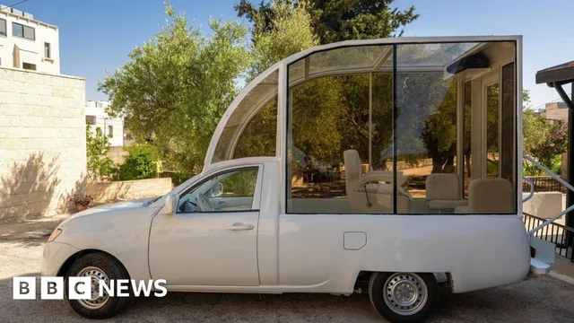 Converted popemobile remains stranded as entry permission to Gaza is delayed