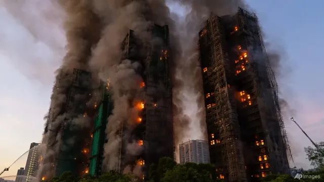 Hong Kong leader John Lee apologizes for deadly Tai Po fire and announces housing secretary's resignation