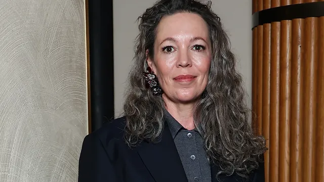Actress Olivia Colman walks Miu Miu runway at Paris Fashion Week