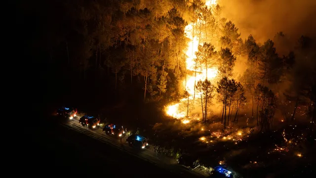 EU crisis chief calls for urgent climate action as wildfires rage in France and Spain