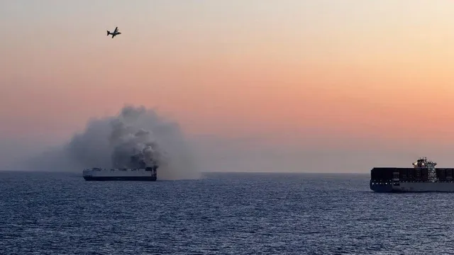 Salvage team races to control burning cargo ship off Alaska's coast