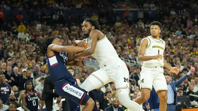 Michigan triumphs over UConn in a controversial national championship game