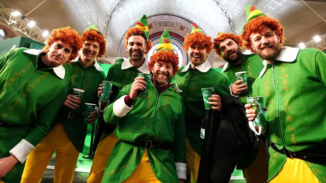 Darts fans celebrate Christmas spirit as Luke Littler takes the stage