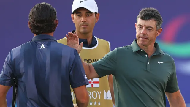 Rory McIlroy shares lead after strong performance in Dubai