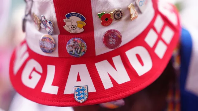 Wearing England badges could intimidate migrants during World Cup