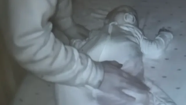 Baby rolls onto stomach despite parents' sleep routine efforts