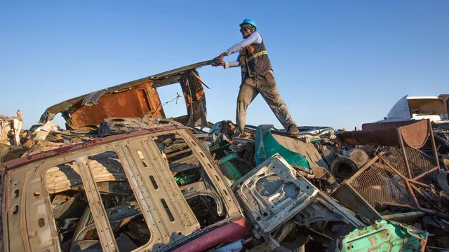 Scrap metal collectors fight poverty and pollution in Zimbabwe