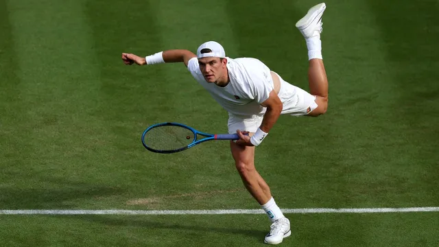 Jack Draper advances at Wimbledon as Sebastian Baez retires injured