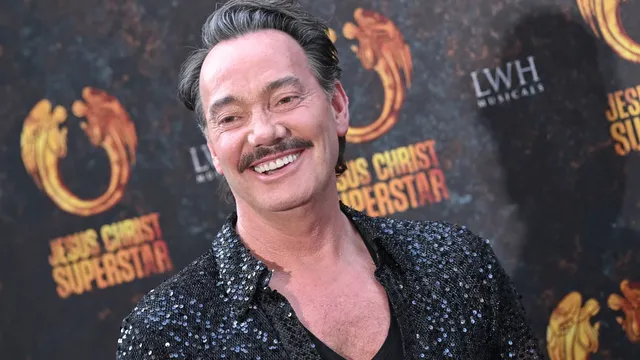 Strictly Come Dancing judge Craig Revel Horwood encourages contestants to fall in love despite 'curse' label