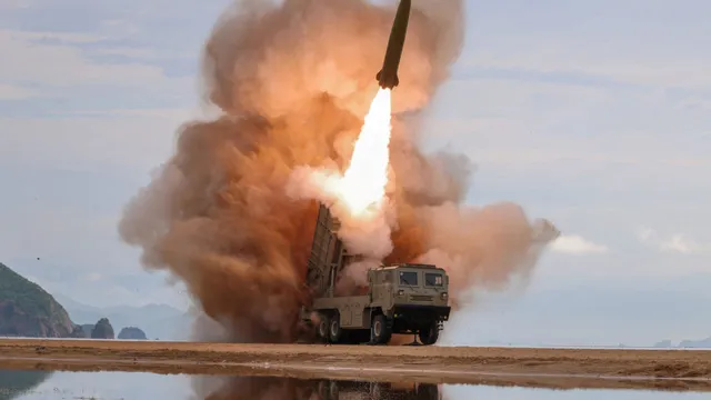 North Korea fires 10 missiles after Trump's overture