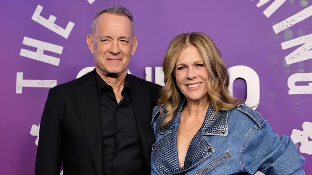 Rita Wilson, wife of actor Tom Hanks, shows new back tattoo matching son Chet Hanks' design
