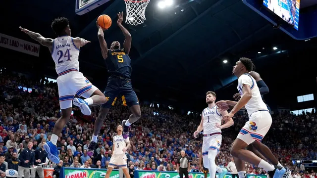 West Virginia edges No. 7 Kansas in shocking comeback victory