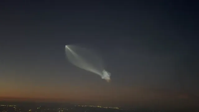 SpaceX Falcon 9 rocket launch from Florida creates glowing 'space jellyfish' in dawn sky