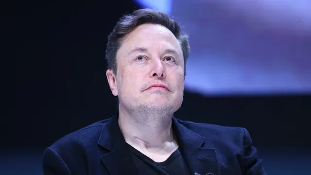 Elon Musk celebrates first self-driving delivery of Tesla