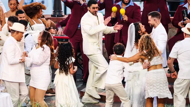 Bad Bunny inspires a young boy by handing him a Grammy during Super Bowl