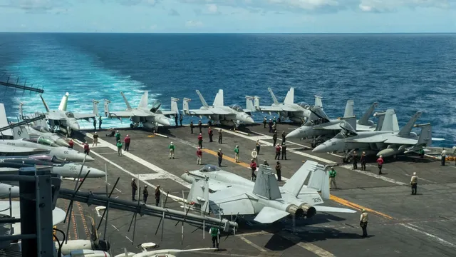 Two U.S. Navy aviators eject from aircraft during landing mishap on USS Dwight D. Eisenhower