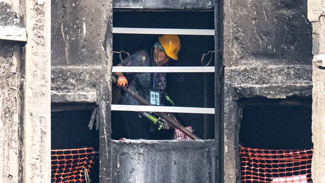 Survivors face challenges returning to charred homes in Hong Kong fire aftermath