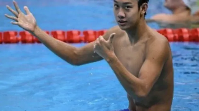 China's Zhang Zhanshuo wins record seventh swimming gold at Asian Games in Tokyo