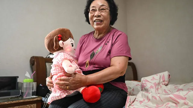 Elderly woman finds companionship in AI doll over human contact