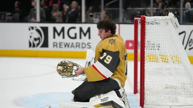 Carter Hart of the Vegas Golden Knights exits morning skate due to injury
