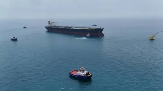 Iran's Revolutionary Guards report three oil tankers caught fire after striking mines in Strait of Hormuz