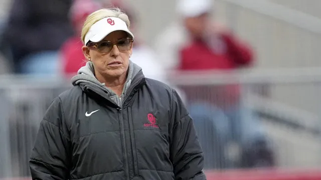 Patty Gasso stands by her players attending rally on women's sports fairness