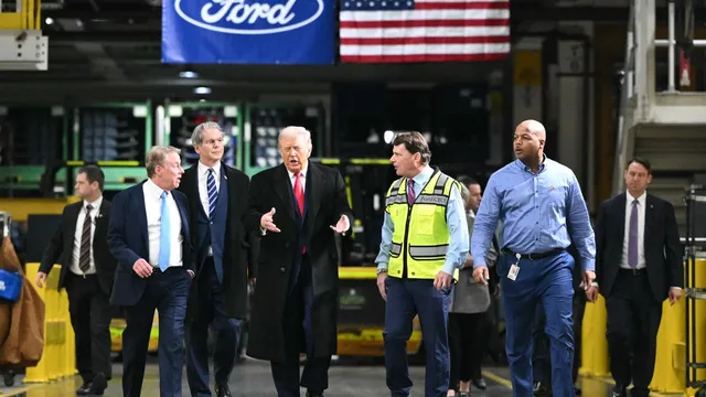 Ford worker heckles Trump, retains job and support from union