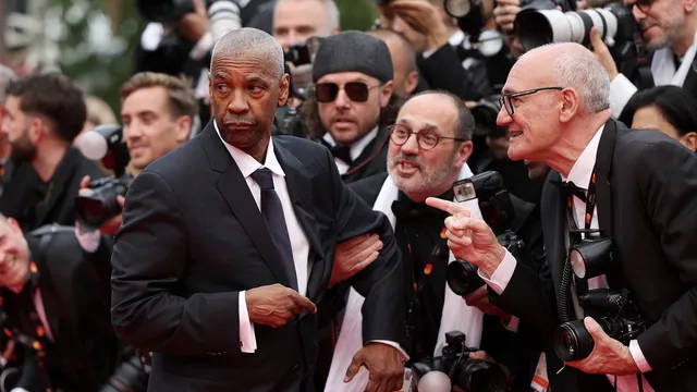 Denzel Washington erupts at Cannes film festival after photographer grabs him
