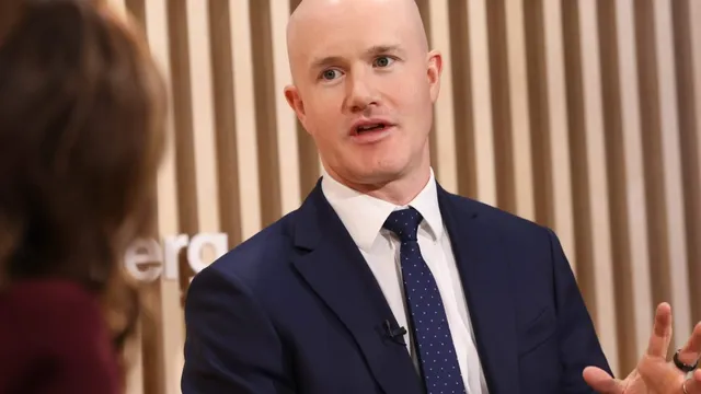 Coinbase faces challenges with significant revenue drop amid leadership changes