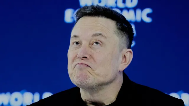 Elon Musk surprises critics with appearance at Davos