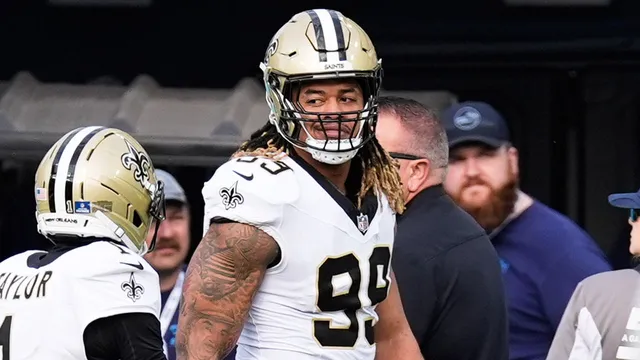 Chase Young scores touchdown after ripping ball from Cam Ward