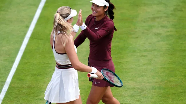Emma Raducanu faces nerves but wins first doubles match at Queen's