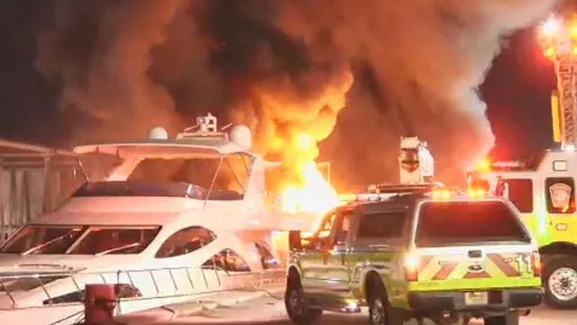 Three yachts destroyed in massive fire in Miami