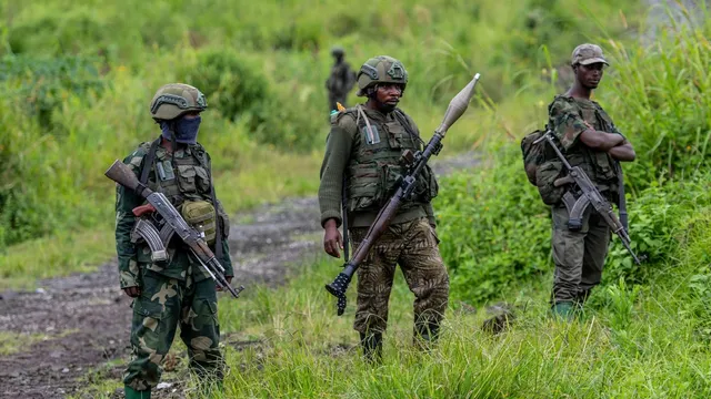 Amnesty International accuses Rwanda-backed M23 rebels of forcing miners in Congo to work and smuggling minerals