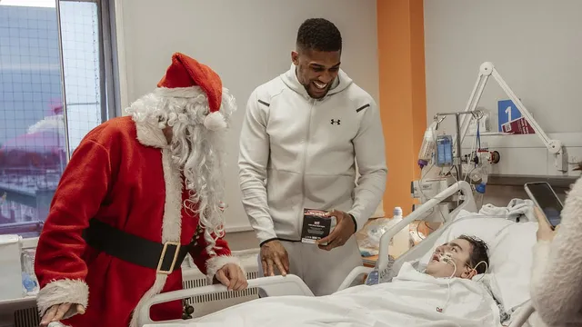 Anthony Joshua spreads joy by gifting presents to sick children at Watford hospital