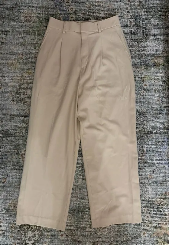 Бежевые брюки Uniqlo