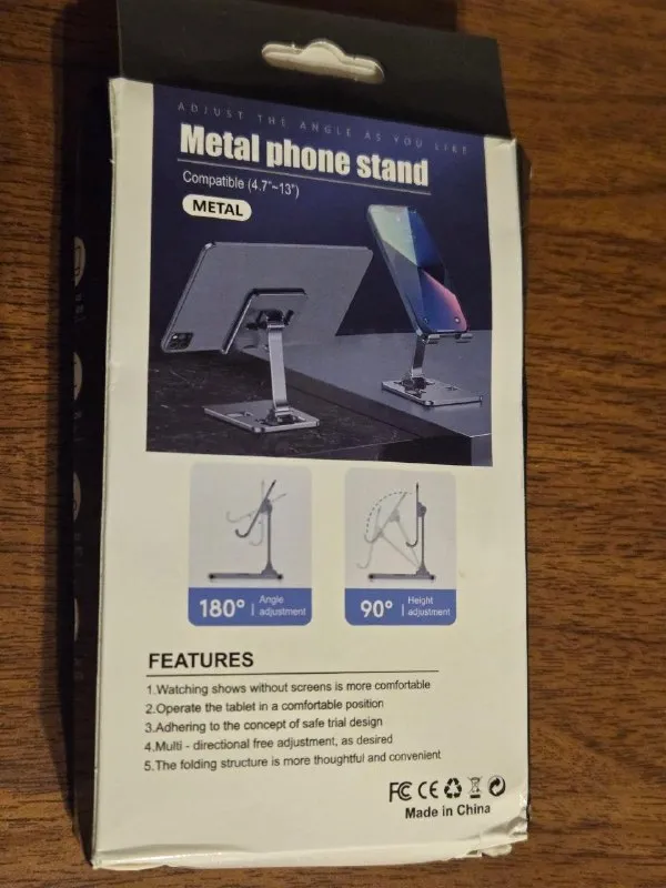 Foldable metal stand for phones and tablets
