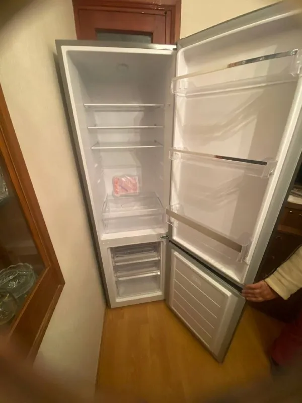 Стиральная машинка и холодильник